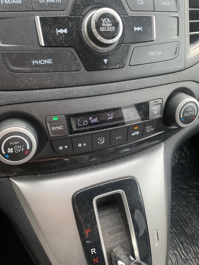 dials in  car’s AC